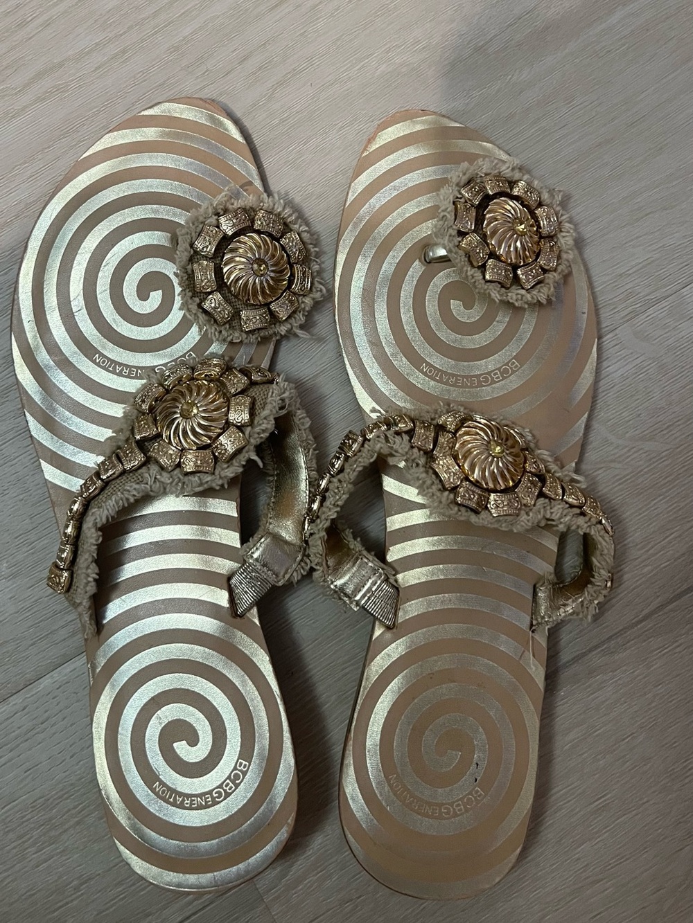 BCBGMaxAzria Metallic Gold Jeweled Spiral Flip Flop Sandals